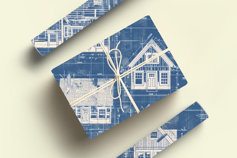 May include: A blue and white gift wrap with a blueprint design of a house. The wrap is tied with a white string bow.