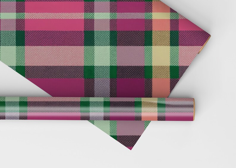 May include: A roll of pink, green, and yellow plaid wrapping paper. The paper is rolled up and the end is folded over.
