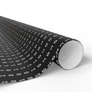 May include: Black and white wrapping paper with a repeating pattern of the binary code 1 and 0.