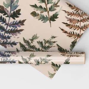 May include: A roll of wrapping paper with a watercolor fern pattern in shades of brown, green, and blue on a cream background.