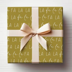 Carta da regalo natalizia dorata Carta da regalo natalizia con scritta moderna Rotolo di carta da regalo Falalalala Rotolo di carta da regalo natalizia dorata
