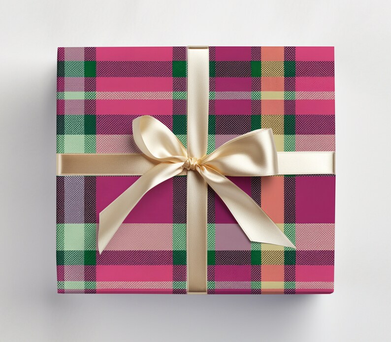 May include: A pink, green, and cream plaid gift box with a gold satin ribbon tied in a bow.
