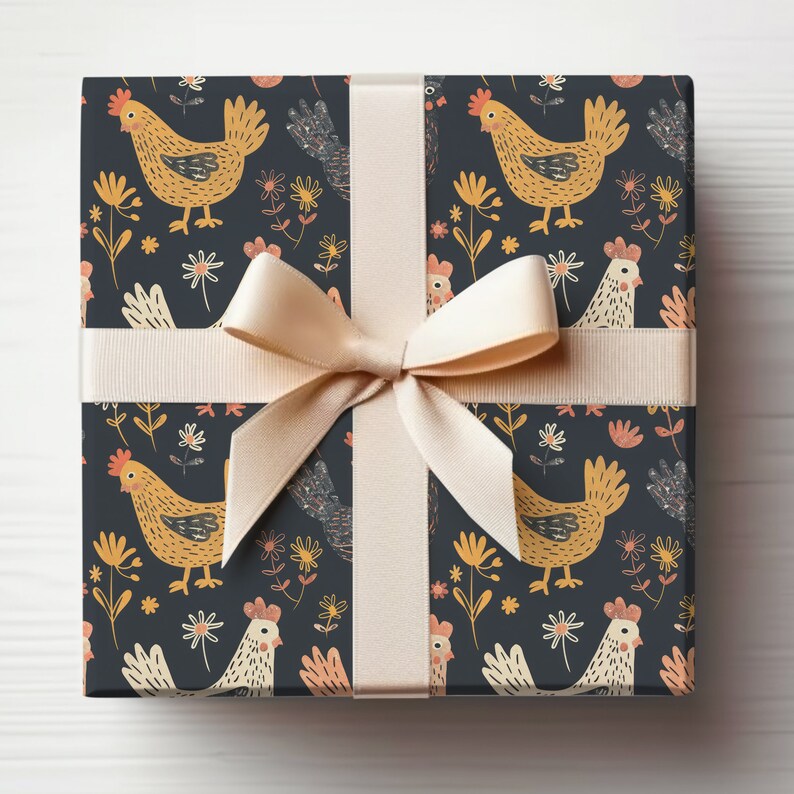 May include: A gift box wrapped in dark blue wrapping paper with a repeating pattern of yellow chickens and white flowers. The box is tied with a cream-colored ribbon.
