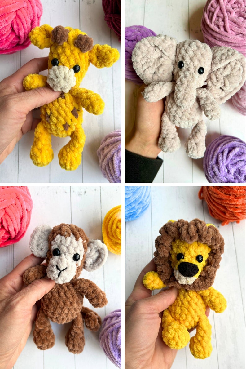 May include: Four crocheted stuffed animals: a yellow giraffe, a light pink elephant, a brown monkey, and a yellow lion with a brown mane. The animals are all made with a fuzzy yarn and have black eyes.