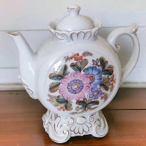 Kettle USSR. Porcelain teapot. Antique. Antique decor. Teapot with a pattern. Present. Collection. Rare teapot. Vintage.antique teapot USSR