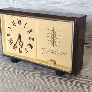 USSR watches.Old watch.USSR alarm clock.Vintage watch.Clock for home. Collectible watches. Antique watch. A table clock.Clock with barometer