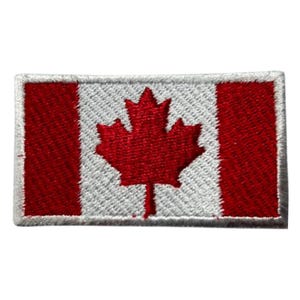 May include: Embroidered patch featuring the Canadian flag. The design includes a red maple leaf centered on a white background, flanked by two red vertical stripes. The patch has a white border.