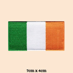 May include: An embroidered Irish flag patch with green, white, and orange stripes. The patch is 7 inches by 4 inches.