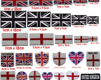 Remembrance Day Soldiers Holding Poppies In Poppy Field Stock