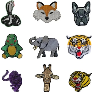 May include: A collection of embroidered patches featuring various animals. Includes a snake, fox, dog, turtle, elephant, tiger, giraffe, and a purple tiger. Each patch has detailed stitching and vibrant colors, suitable for clothing or accessories.