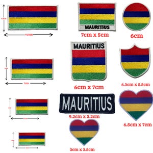 May include: A collection of embroidered patches featuring the flag of Mauritius in various shapes including rectangles, circles, shields, and hearts. Some patches include the text MAURITIUS. Dimensions are provided in centimeters for each item.