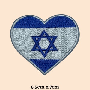 May include: A blue and white heart-shaped embroidered patch featuring the Israeli flag and a six-pointed star. The patch measures 6.5cm by 7cm.