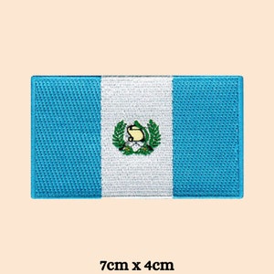 May include: A rectangular patch displaying the Guatemalan flag. The design features light blue and white vertical stripes, with the Guatemalan coat of arms in the centre. The patch measures 7cm x 4cm.