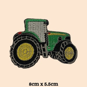 May include: Green and black embroidered tractor patch, 8 inches by 5.5 inches.