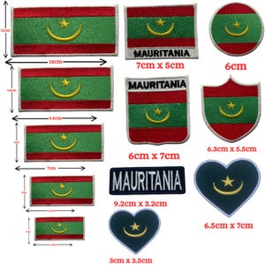 May include: A collection of embroidered patches featuring the Mauritania flag design with red, green, and yellow colors. Shapes include rectangles, circles, shields, and hearts. Some patches include the text MAURITANIA. Dimensions range from 3cm to 18cm.