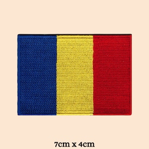 May include: A blue, yellow, and red embroidered patch of the Romanian flag. The patch is 7 cm by 4 cm.