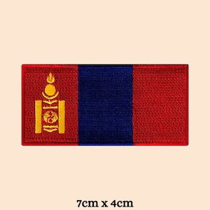May include: Embroidered patch of the Mongolian flag. The rectangular patch has a red border and a design with red and blue vertical stripes. The left side features a gold emblem. The patch measures approximately 7cm x 4cm.
