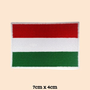 May include: Embroidered patch of the Hungarian flag. The flag is red, white, and green with a white border. The patch is 7cm by 4cm.