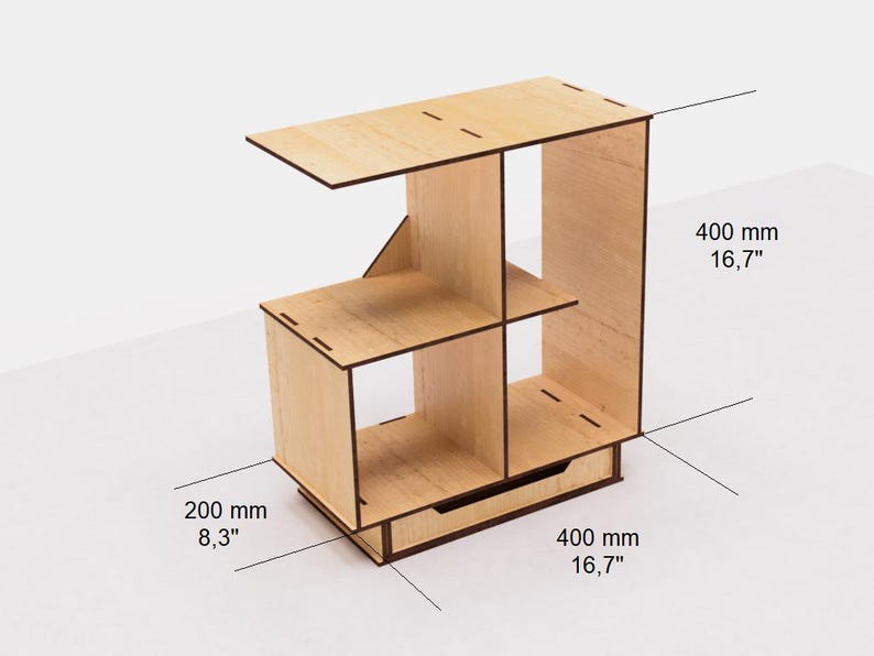 May include: A wooden shelf unit with four compartments and a drawer. The shelf is 16.7 inches wide and 8.3 inches deep. The shelf is made of light wood and has a natural finish.