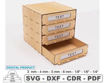 May include: A wooden organiser with four drawers and a pull-out drawer. Each drawer has a clear label with the word "TEXT" printed on it. The organiser is made of light wood and has a natural finish. The organiser is designed to be laser cut and can be assembled with a variety of materials, including wood, acrylic, and metal. The organiser is available in a variety of sizes, including 3 mm, 4 mm, 5 mm, 6 mm, 1/8", 1/6", and 1/4".