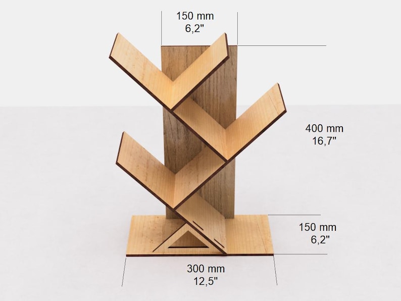 May include: Wooden bookshelf with a tree-like design. It has five shelves and measures 12.5 inches wide, 16.7 inches tall, and 6.2 inches deep.
