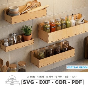 May include: Wooden spice rack shelves with various kitchen items, including jars of spices, bowls, spoons, and a small potted plant. The shelves are mounted on a tiled wall. The image also includes the text "DIGITAL PRODUCT" and "SVG - DXF - CDR - PDF".
