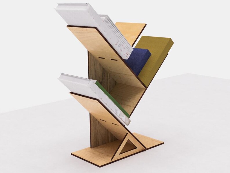 May include: A wooden bookshelf shaped like a tree with four shelves. The shelves are filled with books of different colors and sizes.