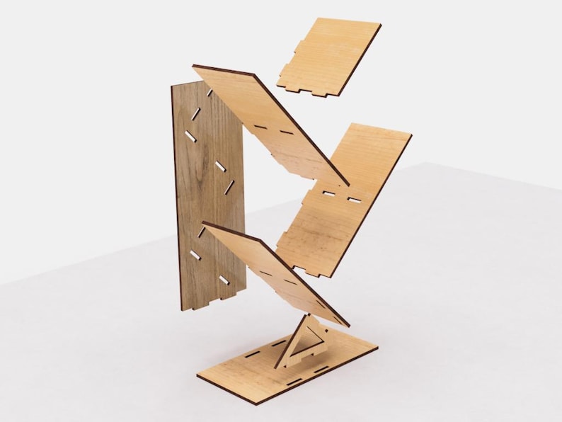 May include: A wooden shelf unit with five pieces, each with a different shape and size. The pieces are made of light brown wood and have a natural finish. The shelf unit is designed to be assembled and can be used to display books, plants, or other decorative items.