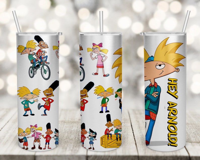 May include: Three stainless steel tumblers with different designs featuring characters from the animated television series Hey Arnold! The first tumbler has a repeating pattern of Arnold and his friends. The second tumbler has a repeating pattern of Arnold and his friends. The third tumbler features a large image of Arnold with the text "Hey Arnold!" in yellow letters.