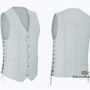 May include: A light gray leather vest with a V-neck, button closure, and two front pockets. The sides feature a lace-up design. The back of the vest is also visible. The vest is a classic style.