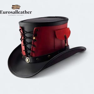 May include: A black and red top hat featuring a front lace-up design with black cord, a black leather band with metallic studs and a gear-shaped accent, and a small side pocket with a red flap. The text Eurosalleather is visible above.