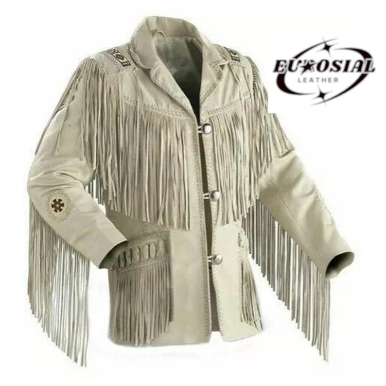 May include: Cream-colored leather jacket with long fringe detailing on the sleeves, chest, and pockets. The jacket features a notched collar, decorative stitching, and three silver-tone buttons. The brand name "EUROSIAI LEATHER" is visible on the upper right.
