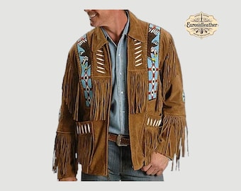 May include: Brown suede jacket with fringe detailing and decorative beadwork. The jacket features an eagle design on the shoulders and chest, with turquoise and white accents. It has a collared neckline and a zipper closure.