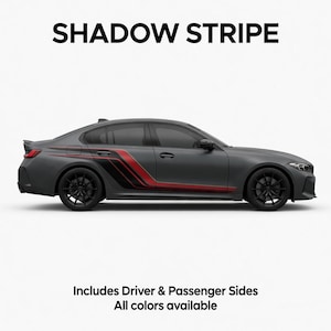 May include: A gray sedan with black wheels and red and black shadow stripe decals. The text "SHADOW STRIPE" is at the top, and the text "Includes Driver & Passenger Sides All colors available" is at the bottom.
