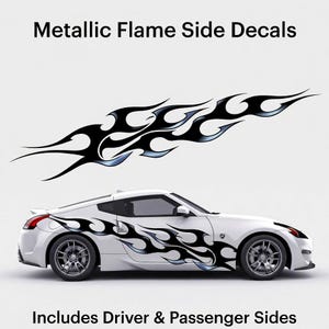 May include: Black and silver metallic flame side decals displayed on a white sports car. The decals are designed for both the driver and passenger sides. The image includes the text "Metallic Flame Side Decals" and "Includes Driver & Passenger Sides".