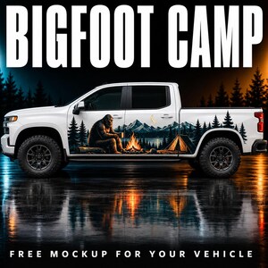 May include: A white pickup truck featuring a side decal of a Bigfoot sitting by a campfire in a forest with mountains and a crescent moon. The text BIGFOOT CAMP appears at the top, and FREE MOCKUP FOR YOUR VEHICLE is printed at the bottom.