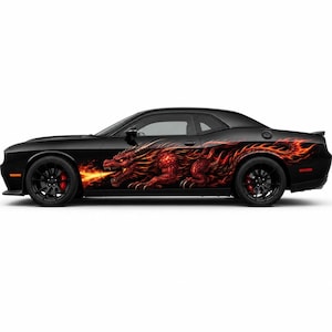 May include: A black two-door coupe featuring a large, detailed graphic decal on the side panel. The decal depicts a red, fire-breathing dragon with intricate scales and flowing flames that extend toward the rear of the vehicle body.