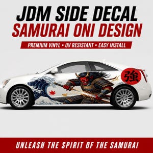 May include: White car with a JDM side decal featuring a samurai oni design. The decal includes a red oni warrior with a sword, a wave pattern, and Japanese text. The text reads "UNLEASH THE SPIRIT OF THE SAMURAI".
