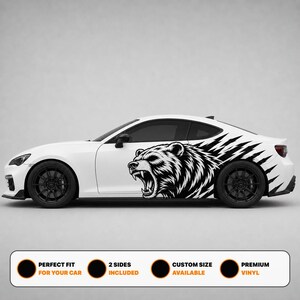 May include: A white sports car featuring a large black and white graphic decal of a snarling bear on the side panel. The decal extends toward the rear with sharp, angular lines. Below the car, text reads: PERFECT FIT FOR YOUR CAR, 2 SIDES INCLUDED, CUSTOM SIZE AVAILABLE, PREMIUM VINYL.