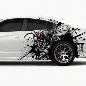 May include: White car with a black and white graphic of a bee on the side. The bee has red eyes and is surrounded by a black splatter design. The car has black tinted windows and a black tire.