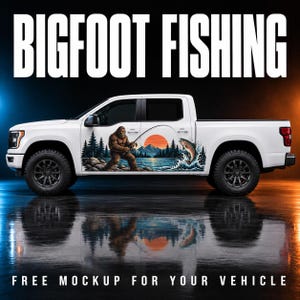 May include: A white pickup truck featuring a large graphic decal on the side panel. The decal depicts a brown Bigfoot creature fishing in a lake with pine trees, mountains, and a sunset in the background. The text BIGFOOT FISHING is at the top.