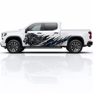 May include: A white pickup truck featuring a large side decal of a black lion head with a flowing mane. The graphic design incorporates a ripped metal effect revealing a glowing blue electric pattern that extends along the vehicle body.