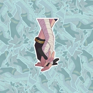 以下が含まれることがあります： 2つの手が握り合っているステッカー。片方の手は白い包帯で包まれ、もう片方は黒い手袋をしています。背景は、手のパターンが描かれた水色です。