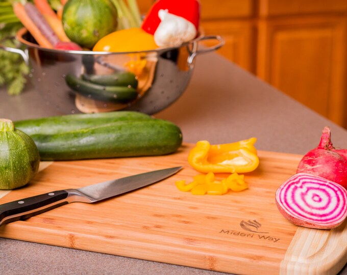 100% Organic Bamboo Cutting Board: Strong, Beautiful Two-toned 1wood cutting board with juice grooves.