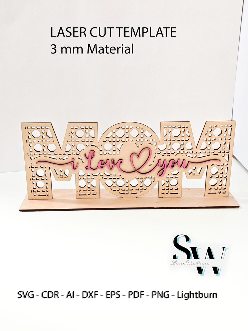 May include: A laser cut template for 3 mm material featuring the word MOM with a cane webbing pattern and a pink script overlay that reads i Love you. The design includes a flat base and text listing file formats SVG, CDR, AI, DXF, EPS, PDF, PNG, Lightburn.