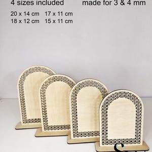 May include: Four laser-cut wooden arch-shaped designs with decorative borders. The designs are on rectangular bases. Text at the top reads "DIGITAL DOWNLOAD LASER CUT FILE". The sizes included are 20 x 14 cm, 17 x 11 cm, 18 x 12 cm, and 15 x 11 cm.