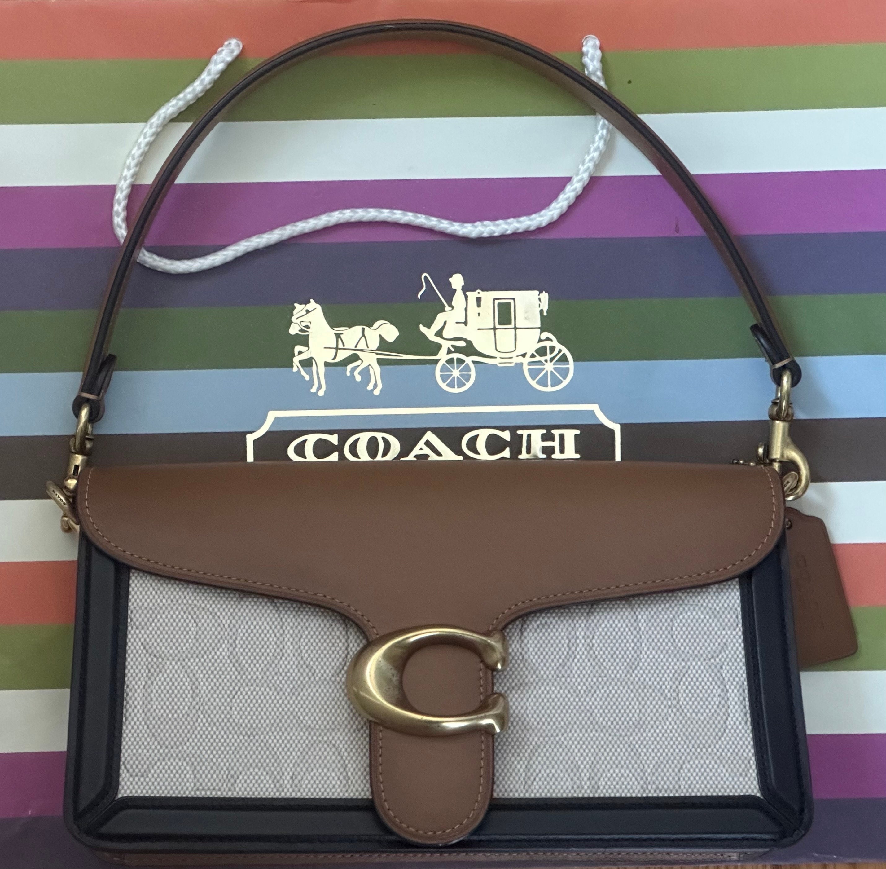 Tabby shoulder bag 26 in blocked signature canvas sale