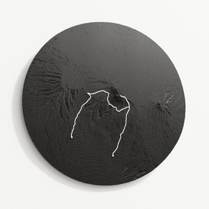 Circle outline, black colour variant hangs on wall, the trail is white.
