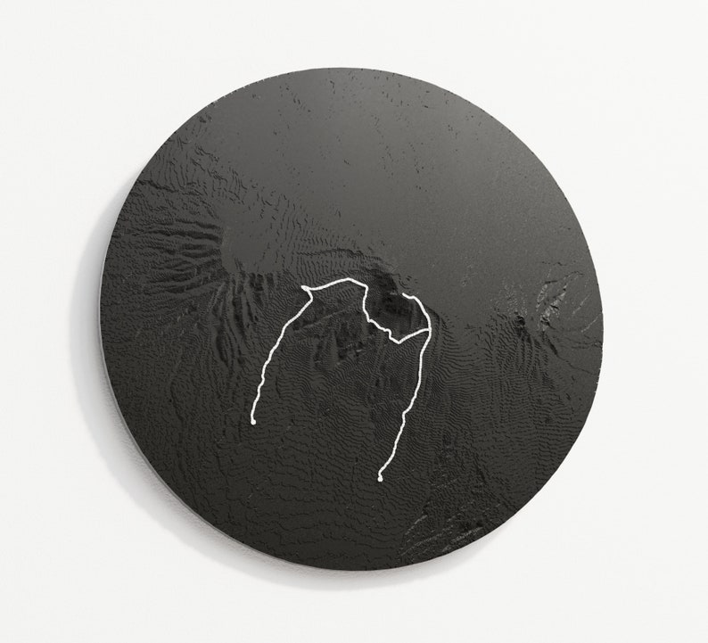 Circle outline, black colour variant hangs on wall, the trail is white.