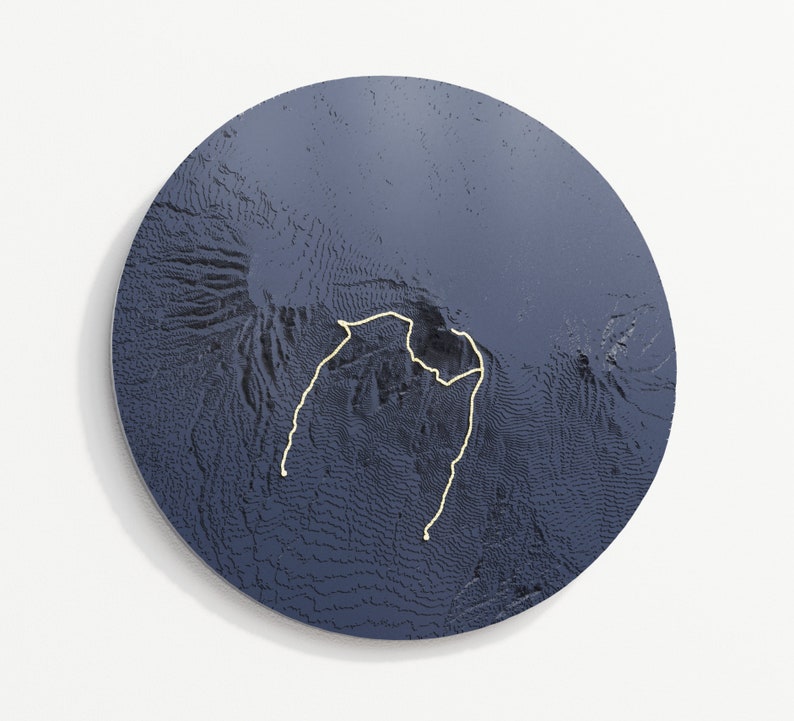 Circle outline, graphite blue colour variant hangs on wall, the trail is almond yellow.